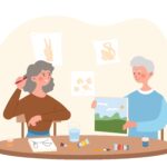 Younger person painting with elderly person